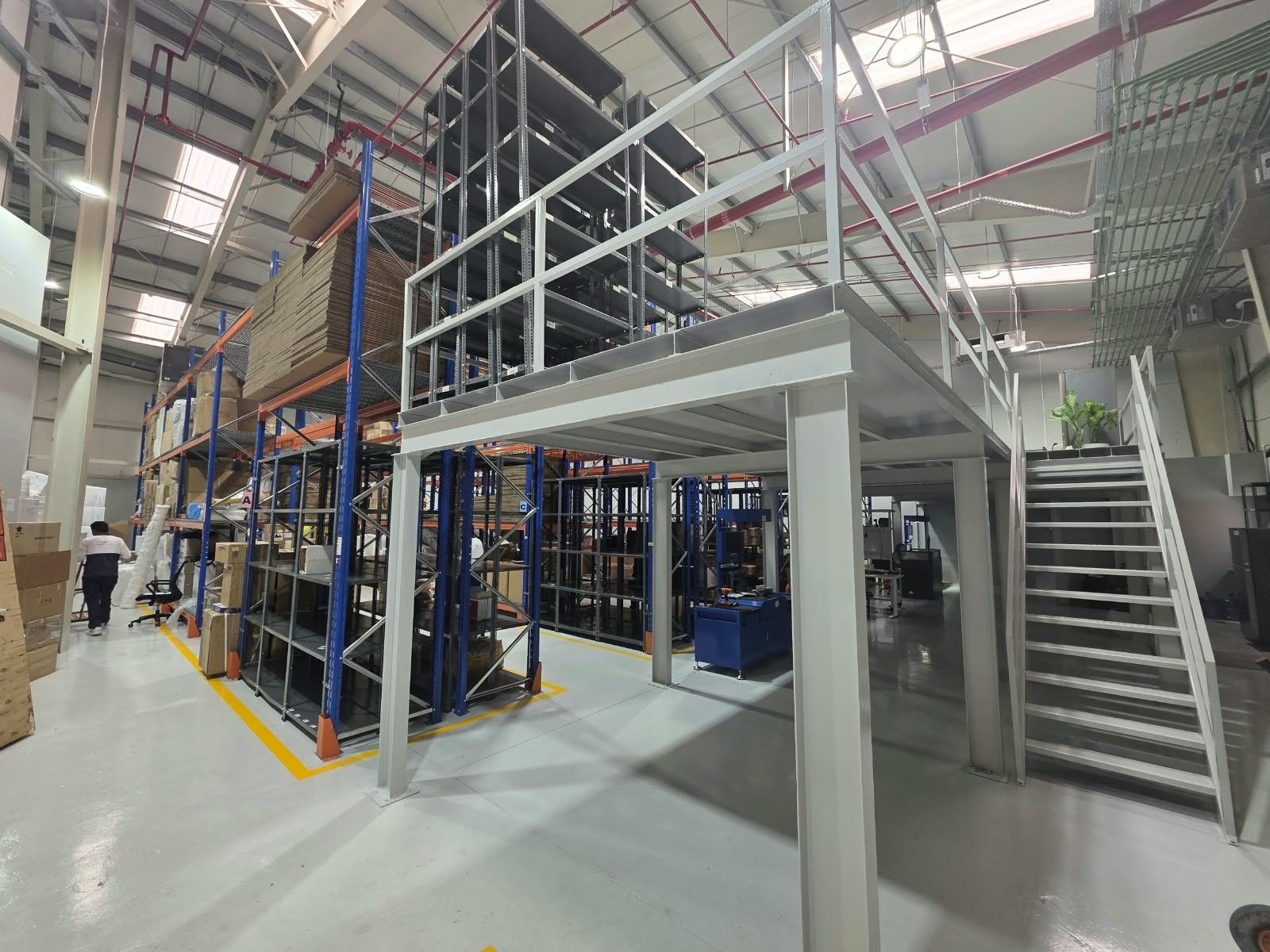 Steel mezzanine with shelving